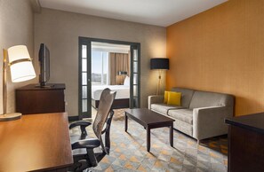 Suite, 1 King Bed | Premium bedding, down duvets, pillow-top beds, in-room safe - DoubleTree by Hilton Pointe Claire Montreal Airport West (Pointe Claire)