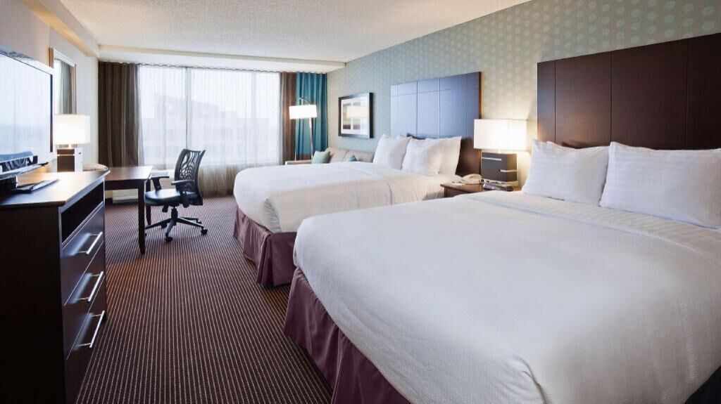 Premium bedding, down duvets, pillow-top beds, in-room safe