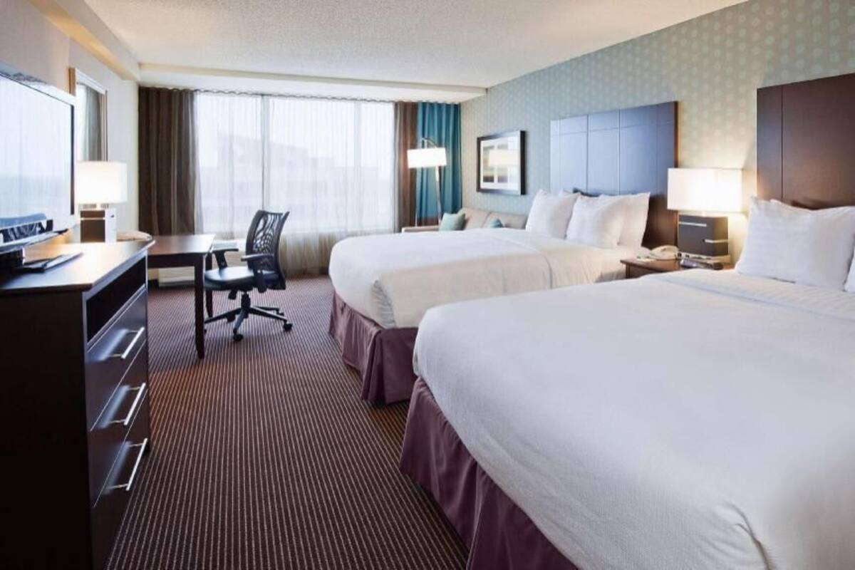 Premium bedding, down duvets, pillow-top beds, in-room safe