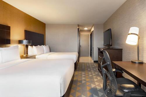 Premium bedding, down duvets, pillow-top beds, in-room safe