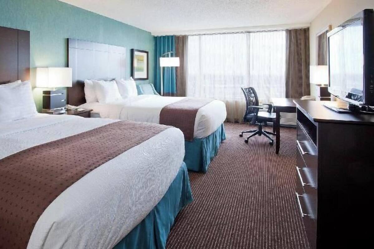 Premium bedding, down duvets, pillow-top beds, in-room safe