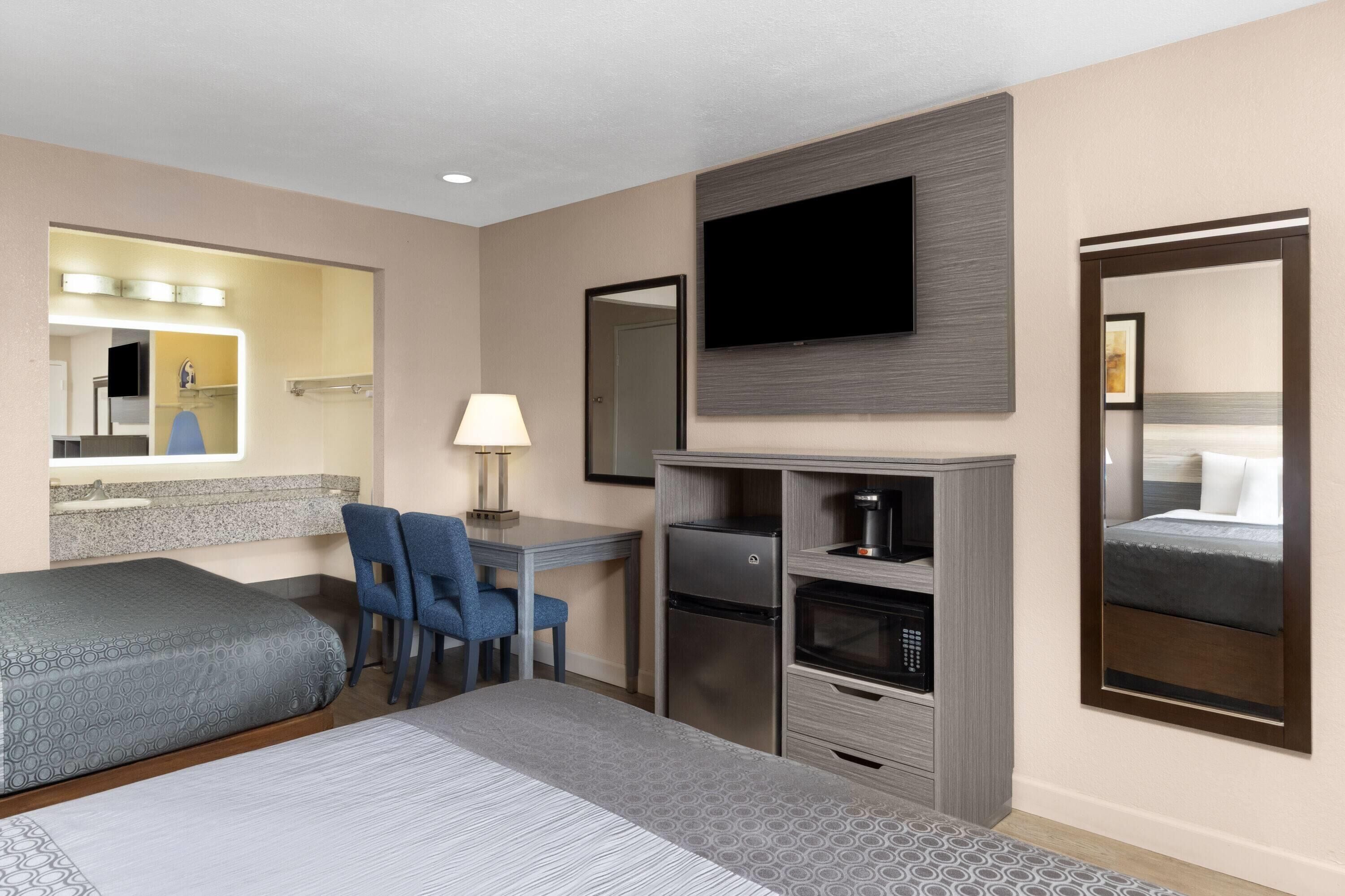 Room, 2 Queen Beds, Non Smoking | In-room safe, iron/ironing board, free WiFi, bed sheets