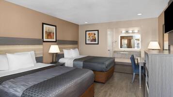 Room, 2 Queen Beds, Non Smoking, Poolside | In-room safe, iron/ironing board, free WiFi, bed sheets