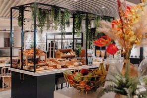 Indulge in a variety of baked goods and pastries at our central counter.