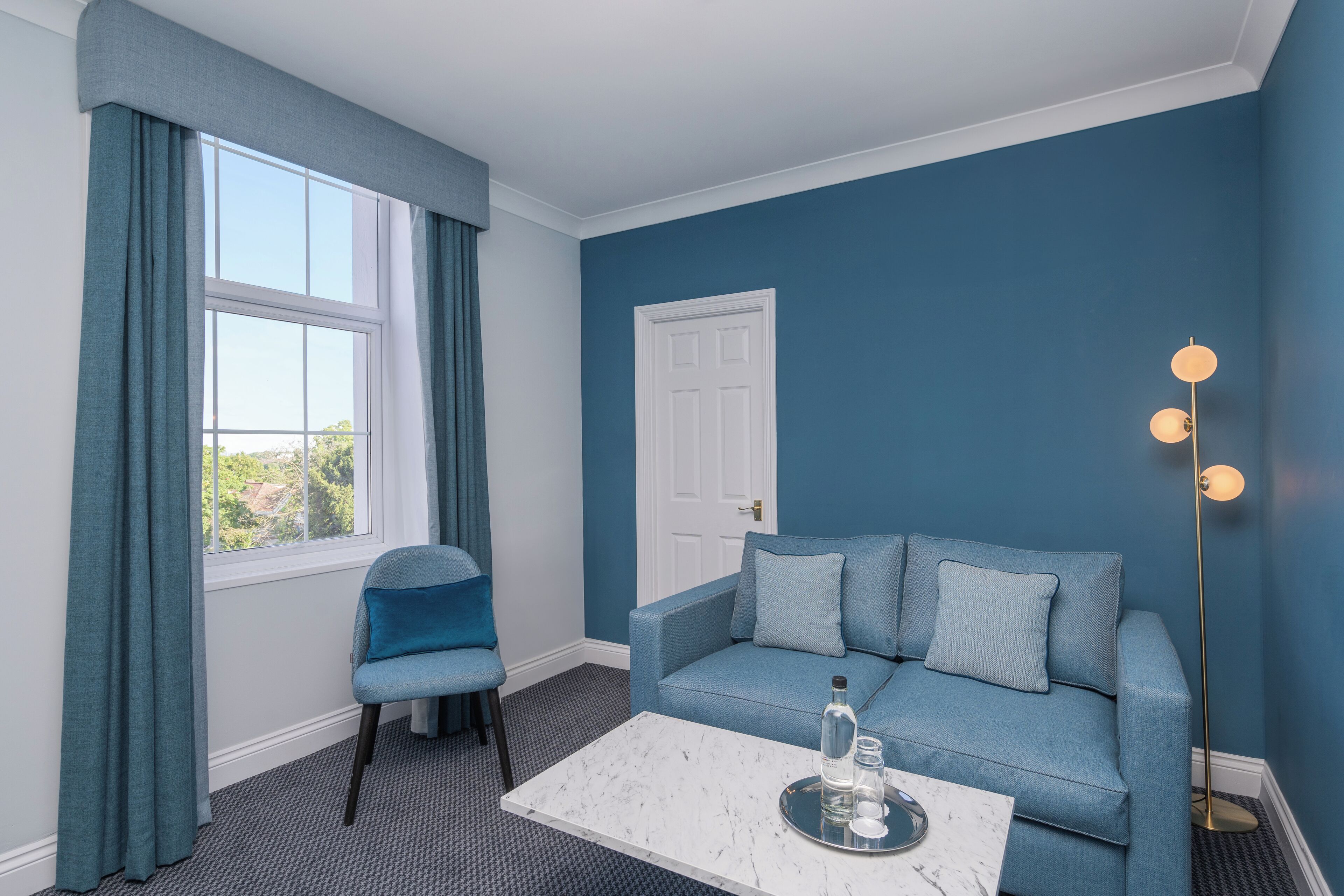 junior suite | in-room safe, desk, laptop workspace, iron/ironing board