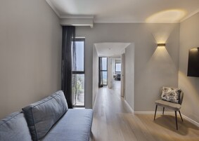 Junior Suite Lake view Balcony | Minibar, in-room safe, desk, laptop workspace