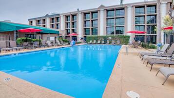 Seasonal outdoor pool, open 8 AM to 8:00 PM, pool umbrellas