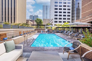 Outdoor pool, open 8:00 AM to 10:00 PM, pool loungers