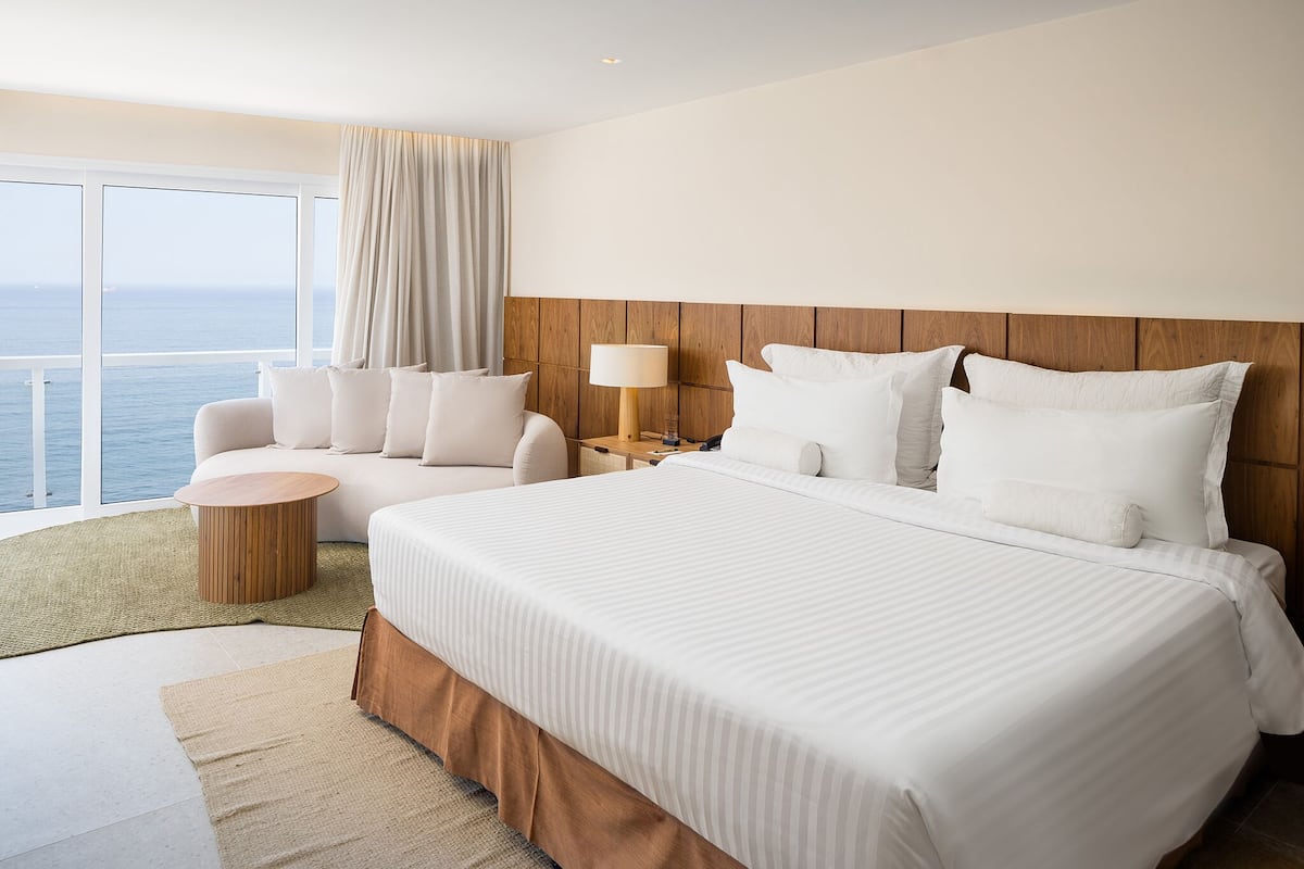 Presidential Suite, Sea View | Minibar, in-room safe, desk, blackout curtains