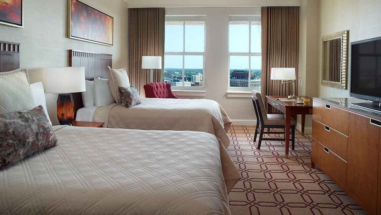 Premium bedding, down duvets, in-room safe, desk