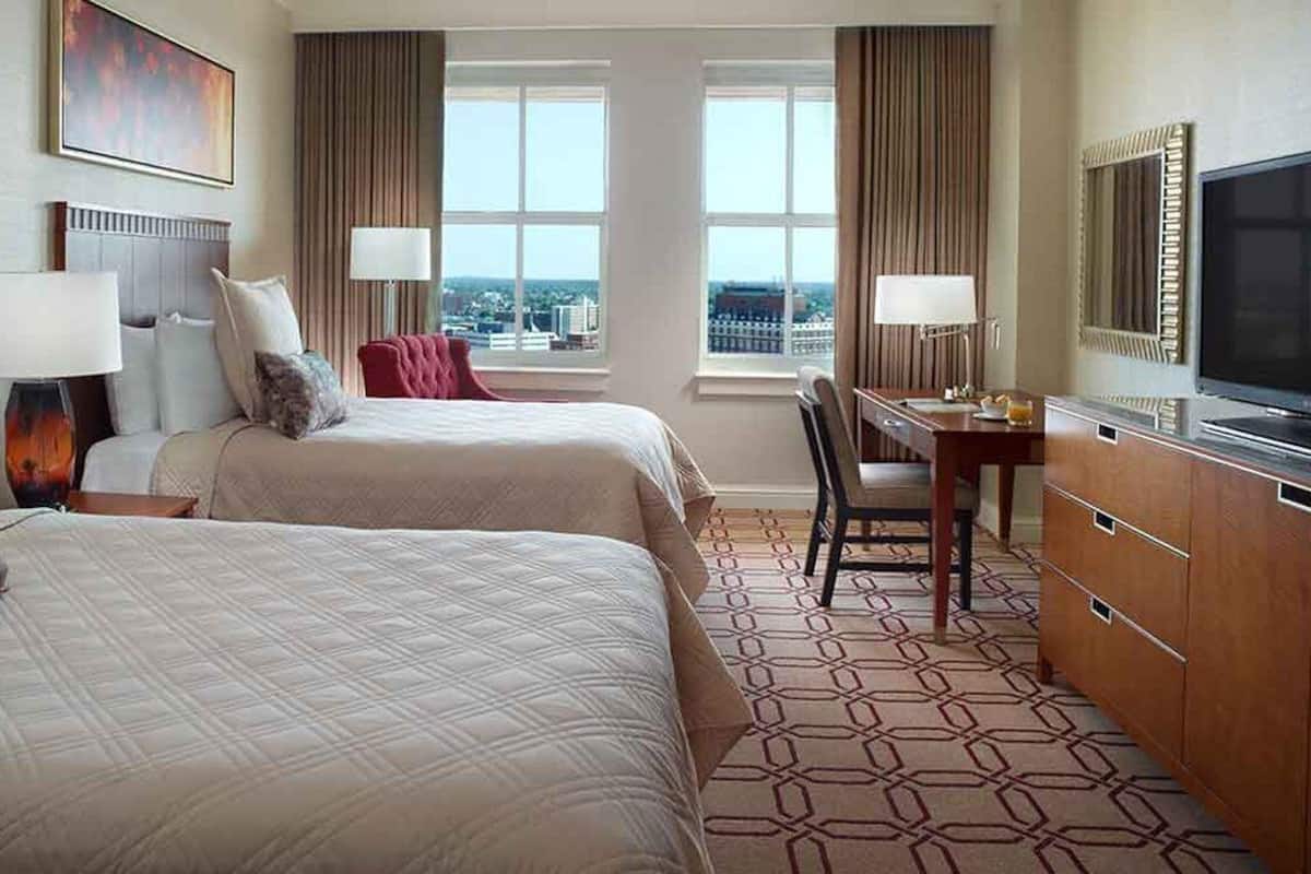 Premium bedding, down comforters, in-room safe, desk