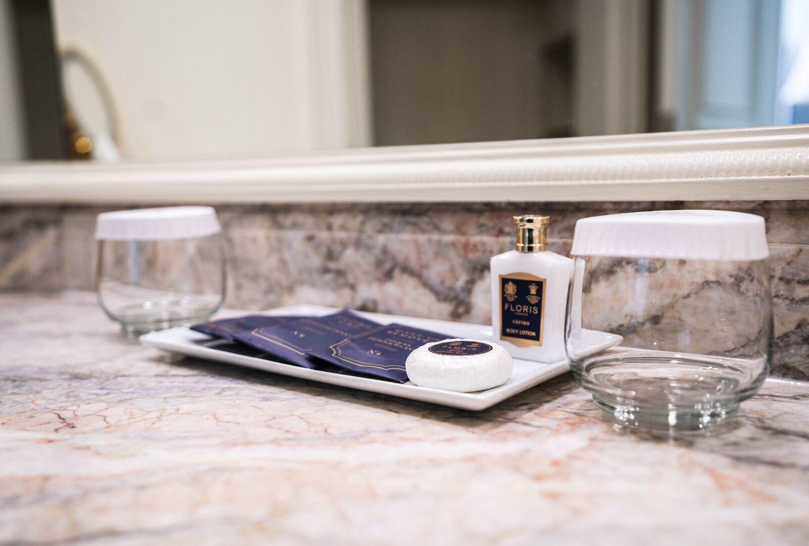 combined shower/bathtub, designer toiletries, hair dryer, bathrobes