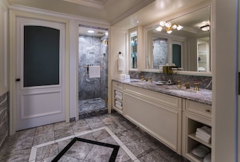Combined shower/tub, designer toiletries, hair dryer, bathrobes at Westgate Hotel