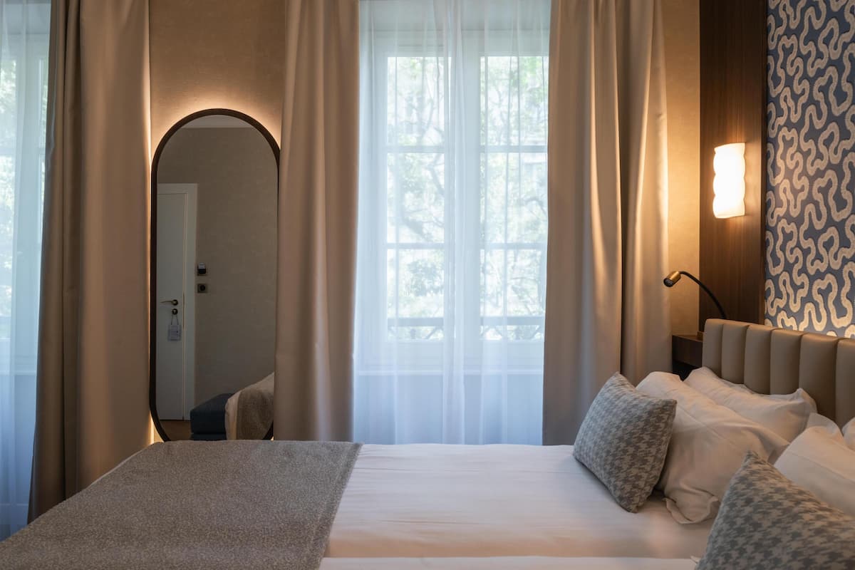 In-room safe, desk, laptop workspace, blackout curtains