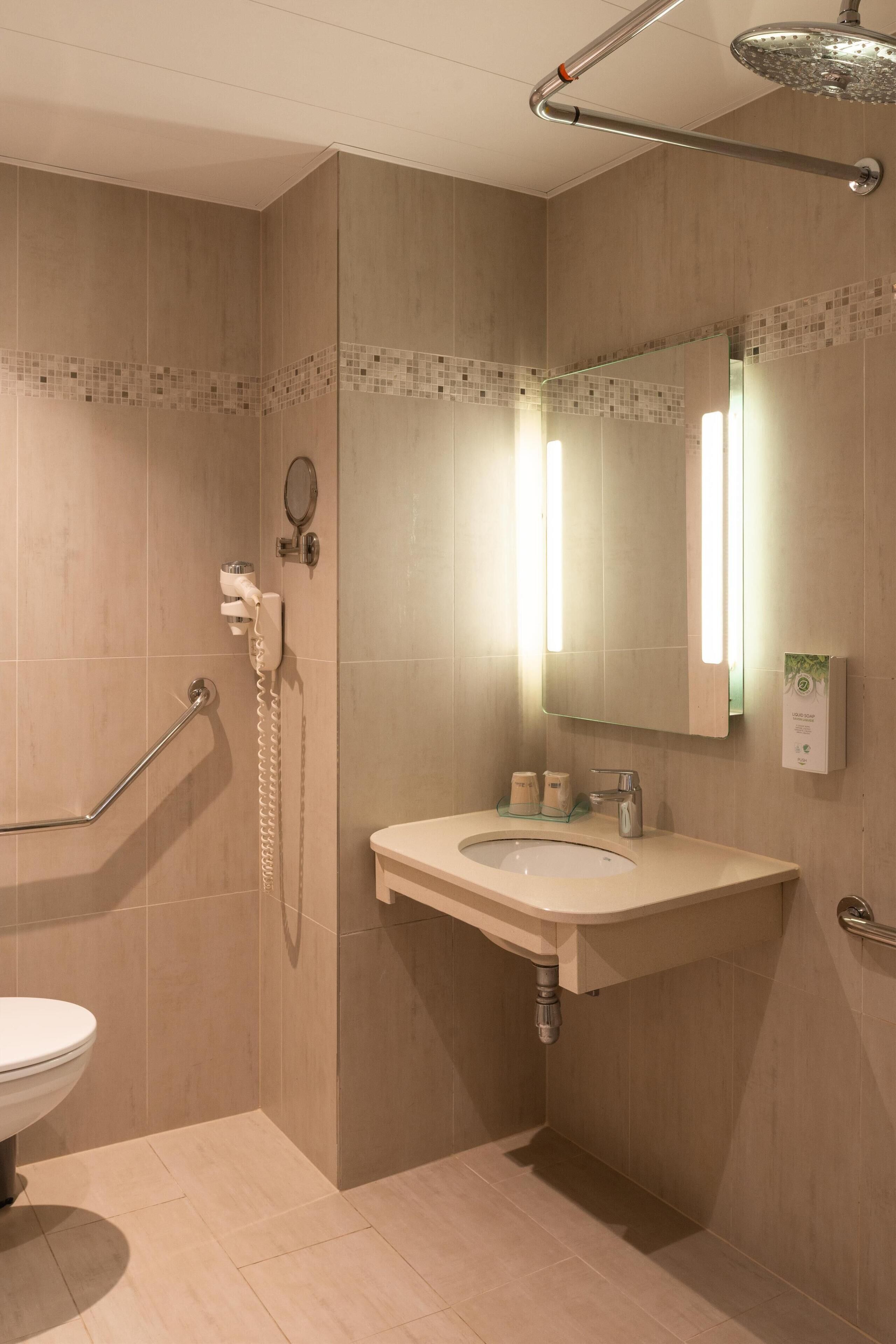 hair dryer, towels, soap, shampoo