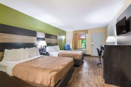 Down comforters, desk, iron/ironing board, rollaway beds