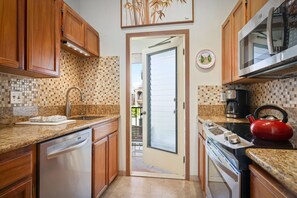 Suite, 1 King Bed, Ocean View | Private kitchenette | Full-size fridge, microwave, oven, stovetop