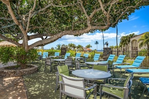 Outdoor pool, open 8:00 AM to 9:30 PM, pool loungers