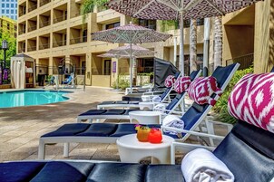 Outdoor pool, open 7:00 AM to 10:00 PM, free cabanas, pool umbrellas