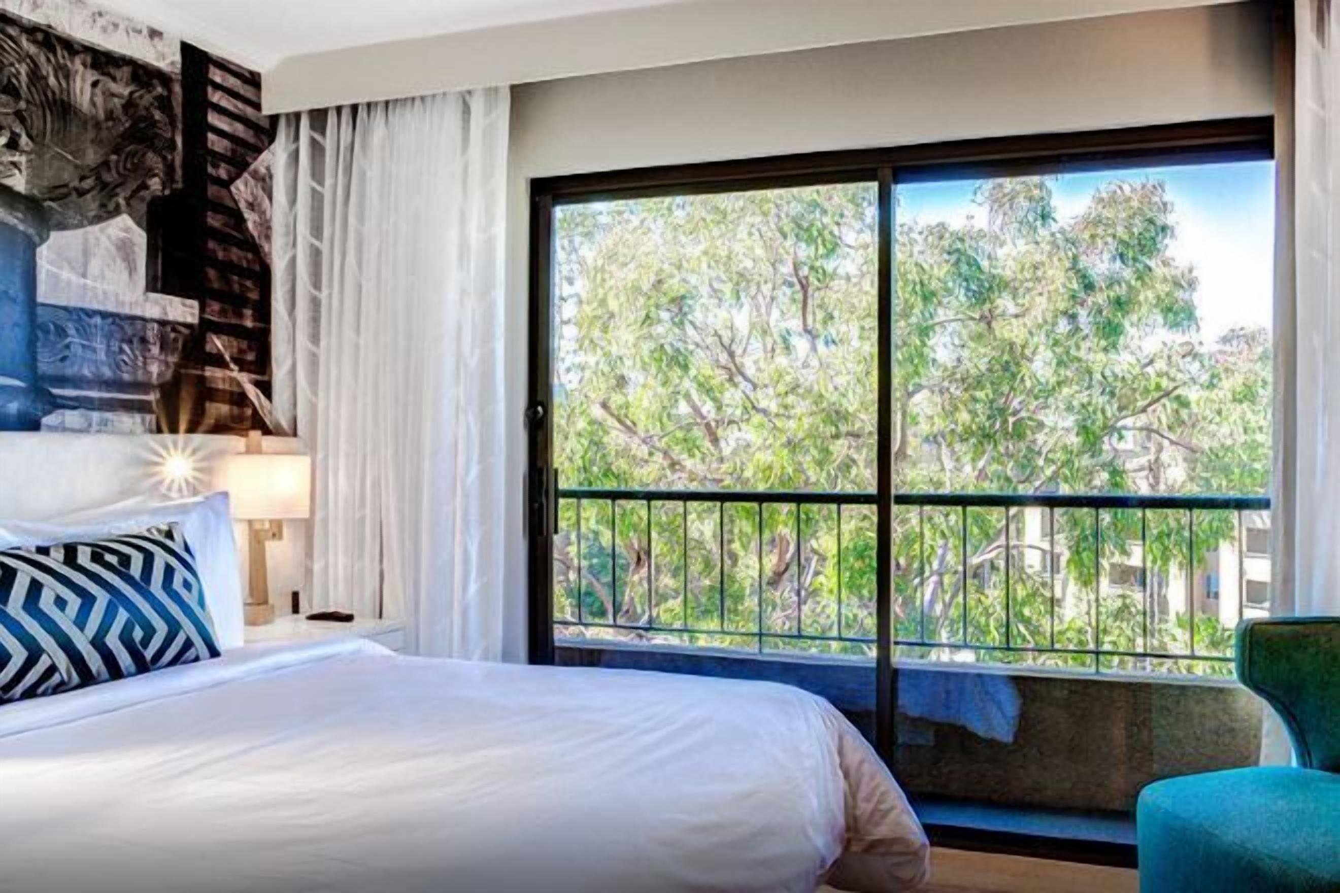 Premium bedding, down comforters, pillowtop beds, minibar