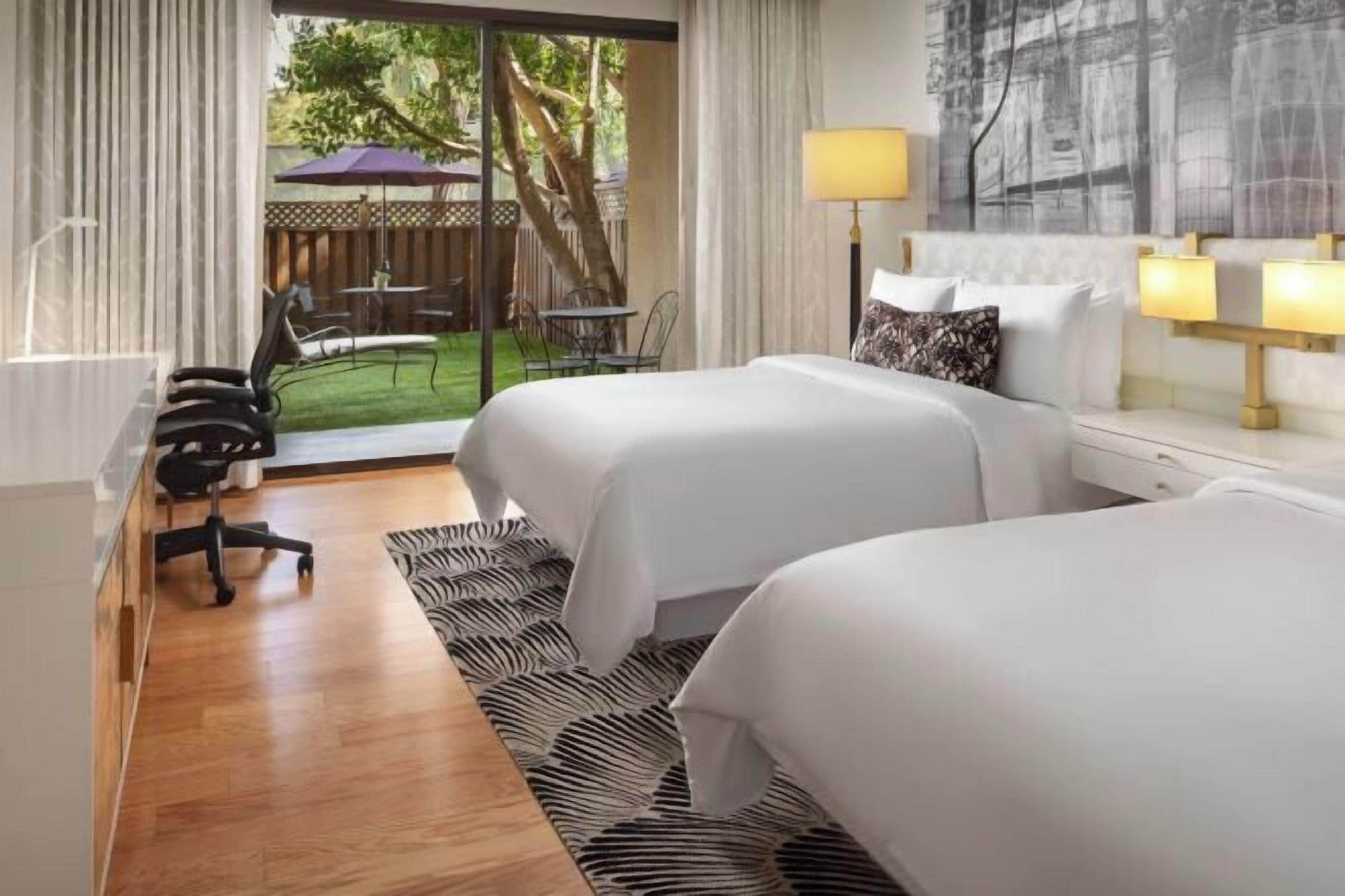 Premium bedding, down comforters, pillowtop beds, minibar