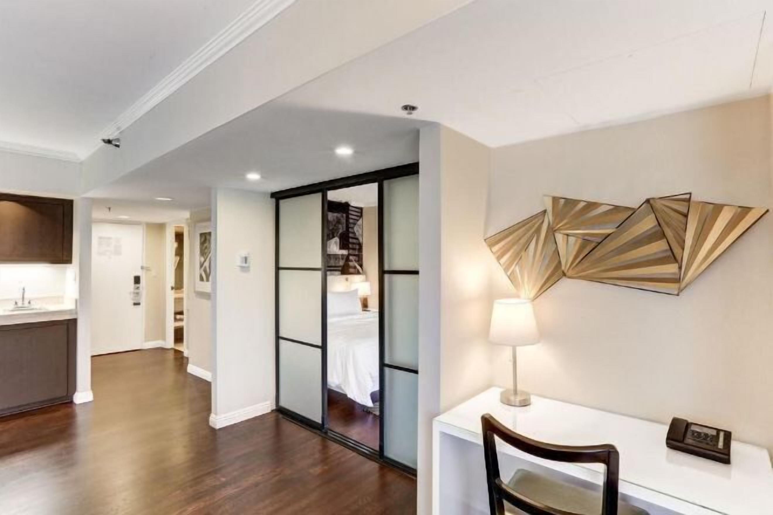 Premium bedding, down comforters, pillowtop beds, minibar