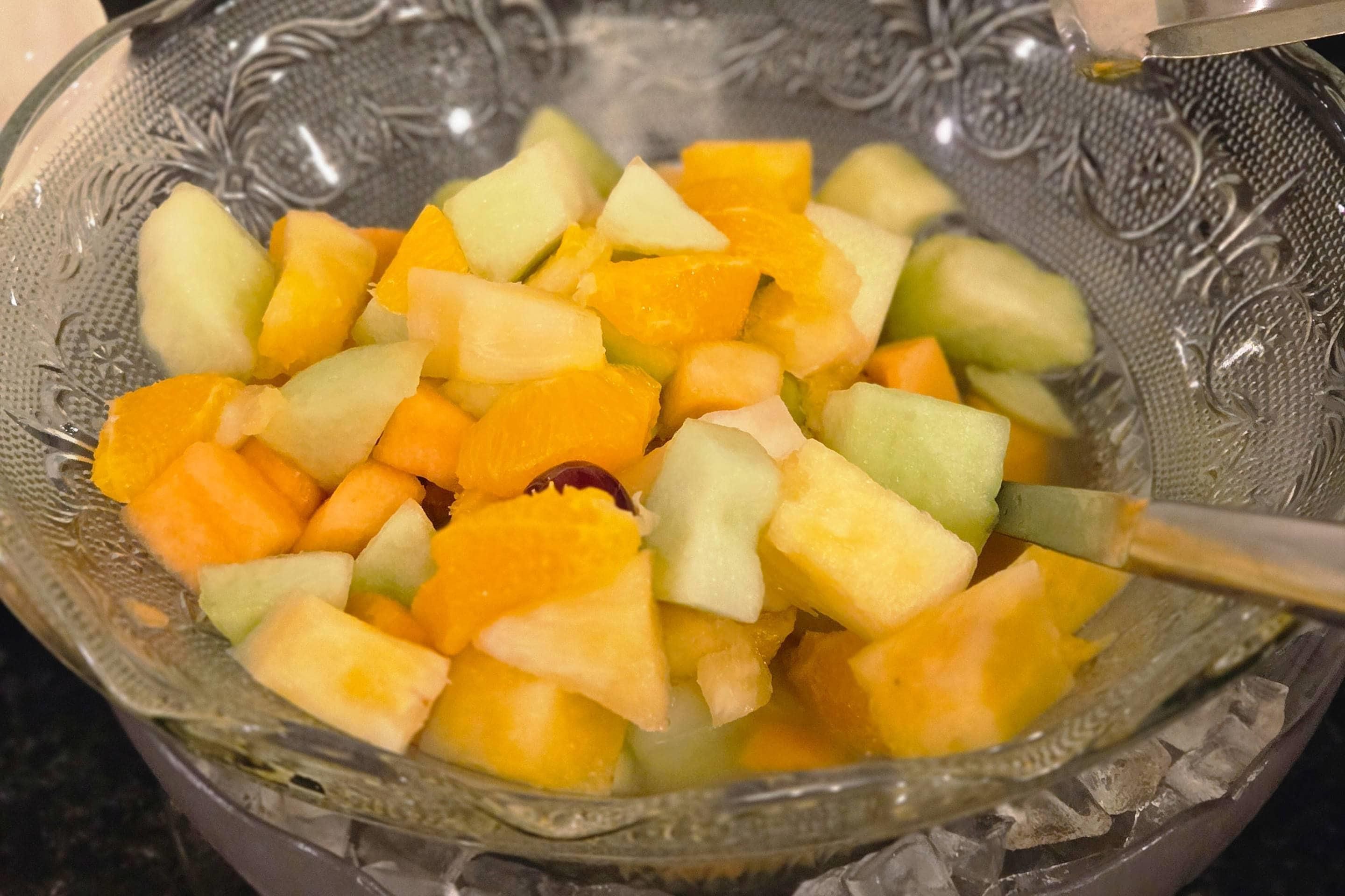 A bowl of diced fruit.