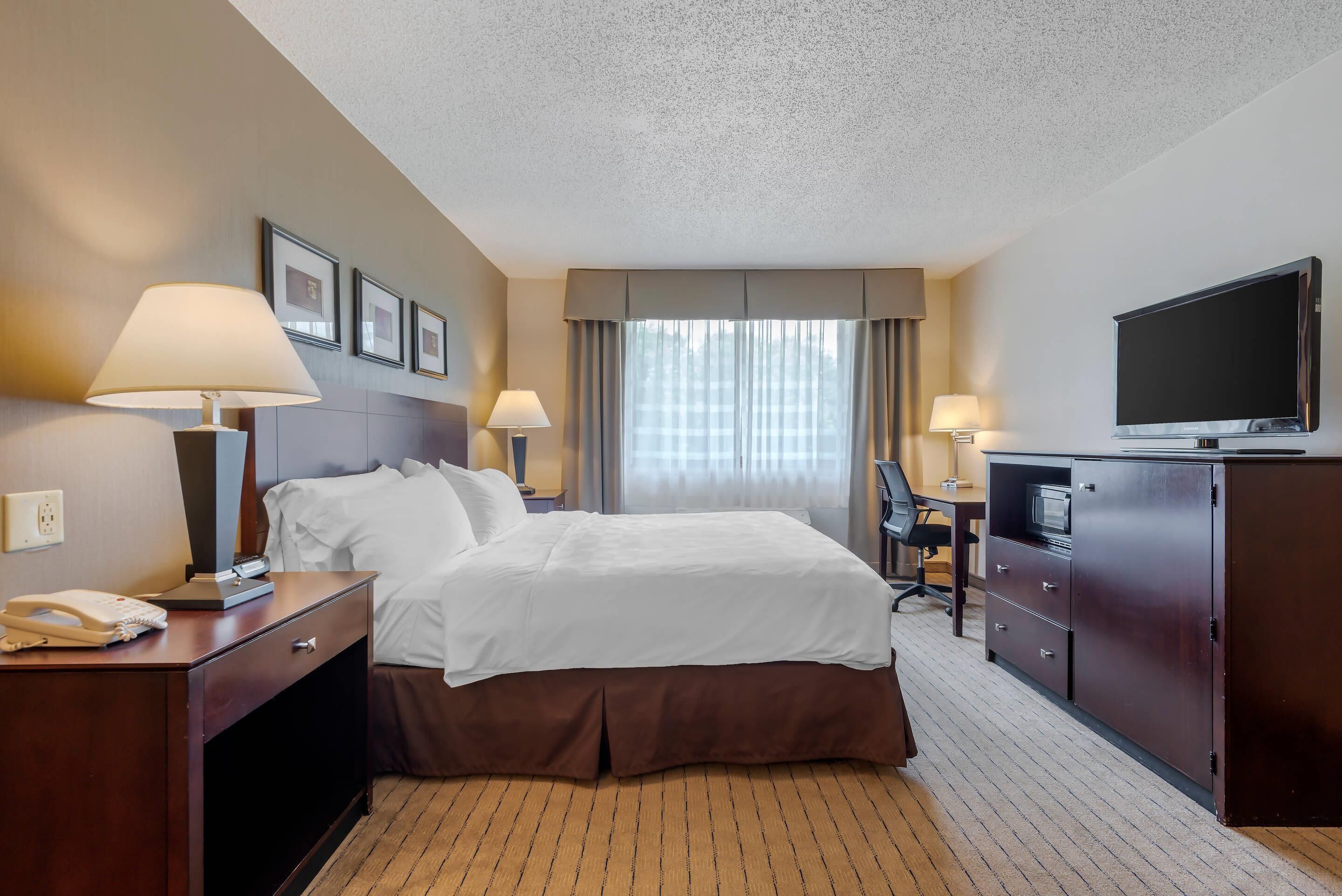 desk, laptop workspace, blackout curtains, iron/ironing board