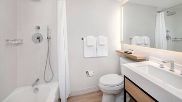Combined shower/bathtub, free toiletries, hair dryer, bathrobes