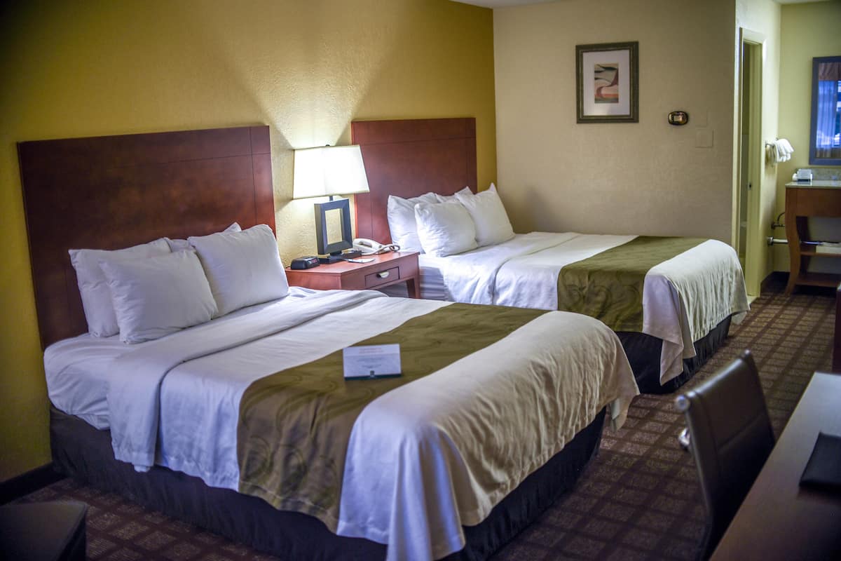 Standard Room, 2 Queen Beds, Non Smoking | Desk, iron/ironing board, cribs/infant beds, rollaway beds