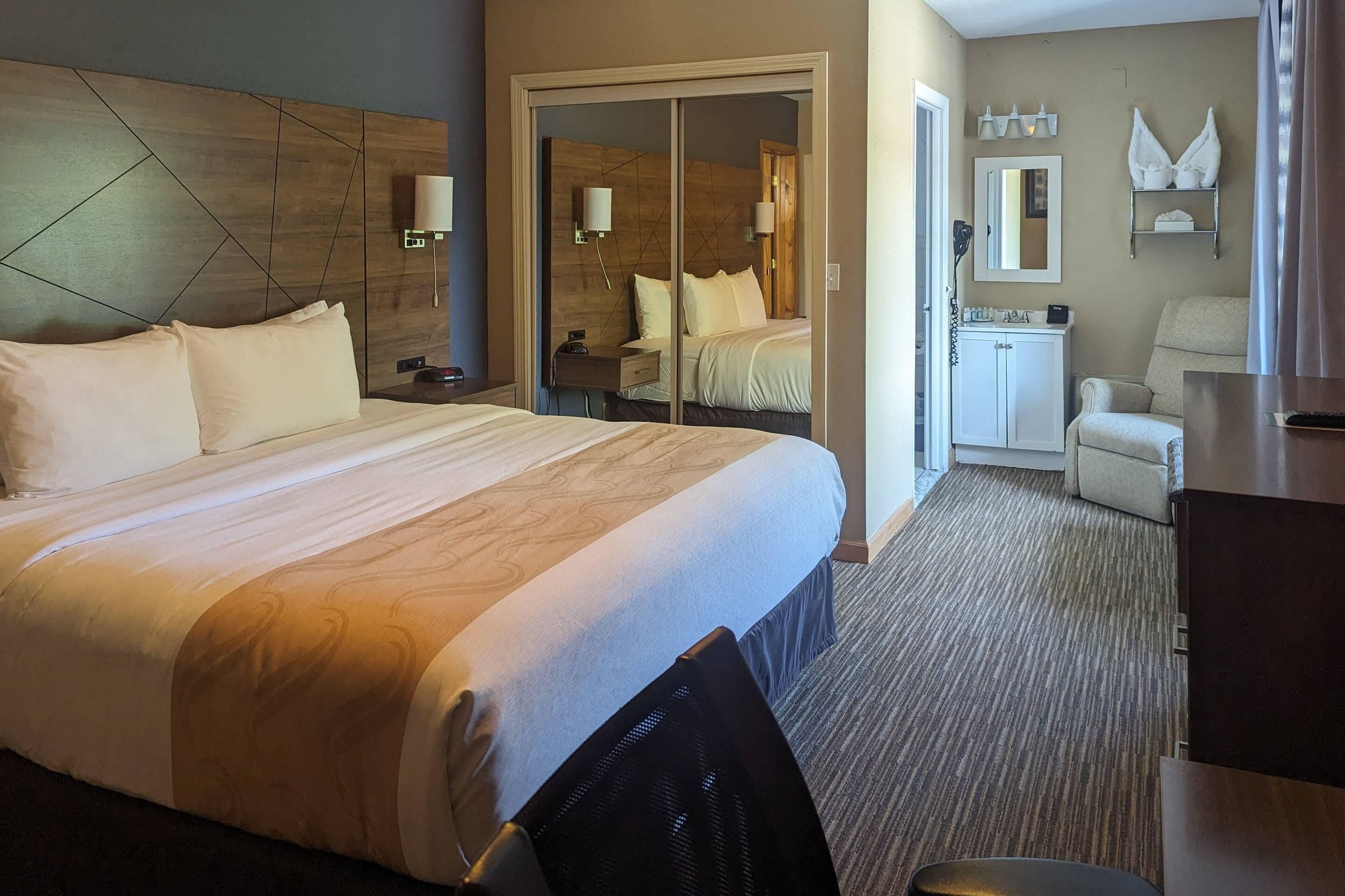 Suite, 1 King Bed with Sofa bed, Non Smoking (Exterior Corridor) | Desk, iron/ironing board, cribs/infant beds, rollaway beds