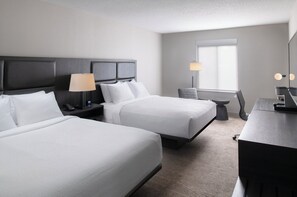 Premium bedding, desk, laptop workspace, iron/ironing board