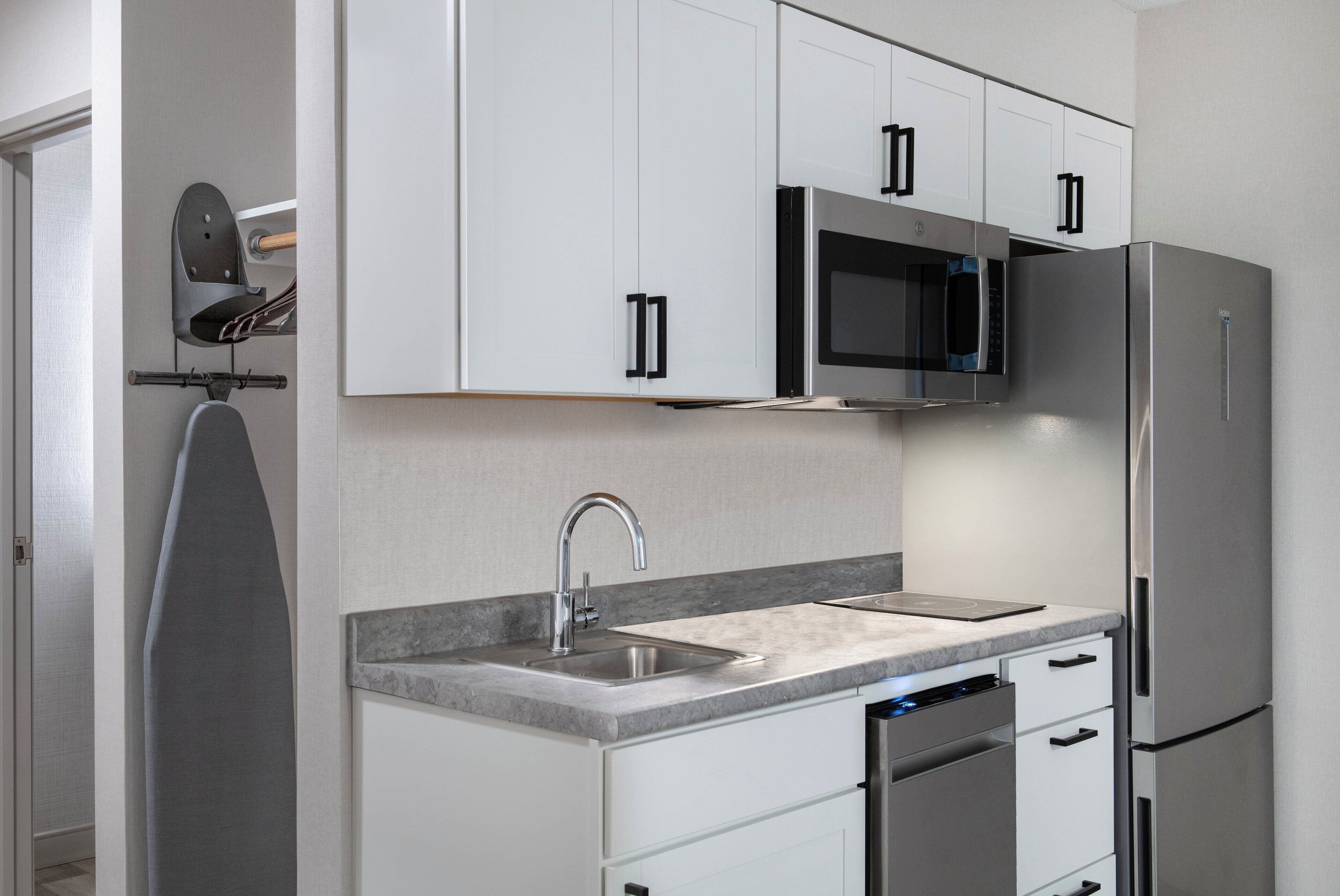 suite, 1 bedroom | premium bedding, desk, laptop workspace, iron/ironing board