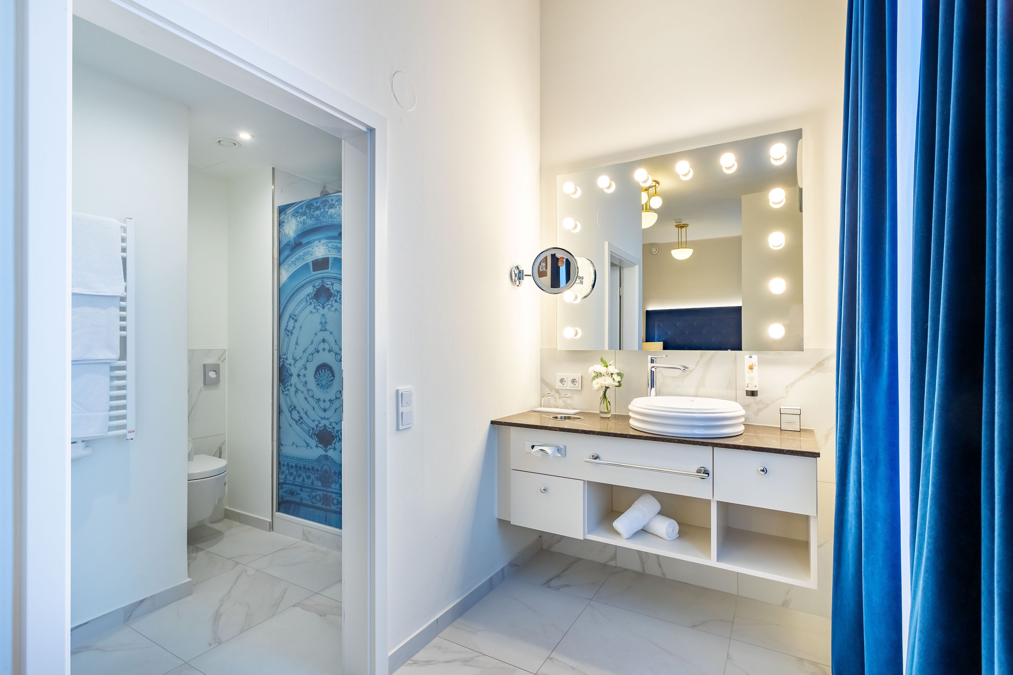 deep-soaking bathtub, rainfall showerhead, free toiletries, hair dryer