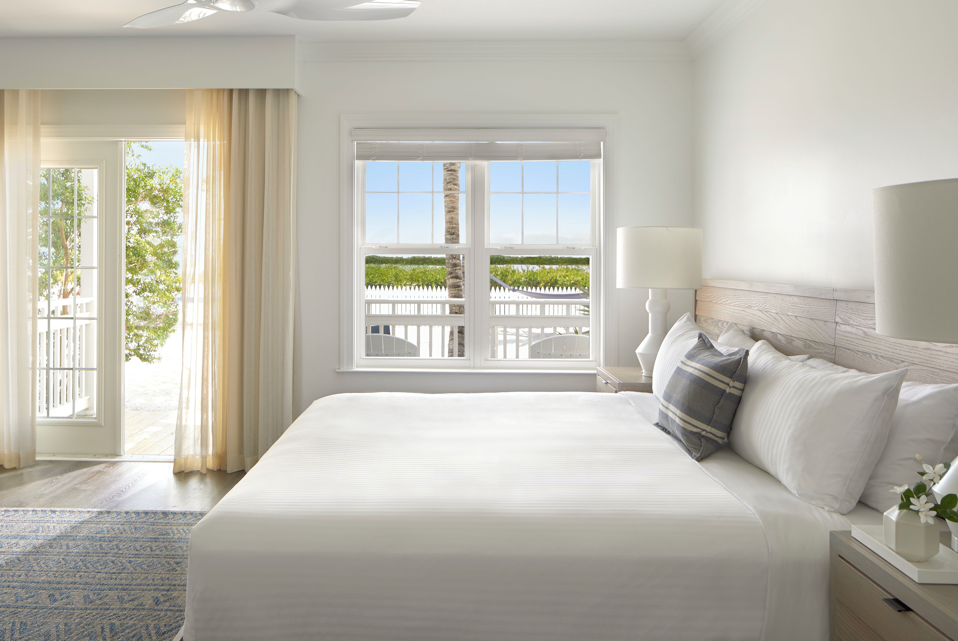 waterfront king guest room | premium bedding, minibar, in-room safe, individually decorated