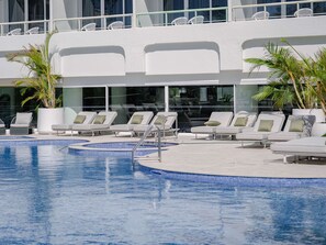 Indoor pool, outdoor pool, open 8:00 AM to 8:00 PM, sun loungers