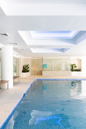 Indoor pool, outdoor pool, open 8:00 AM to 8:00 PM, pool loungers