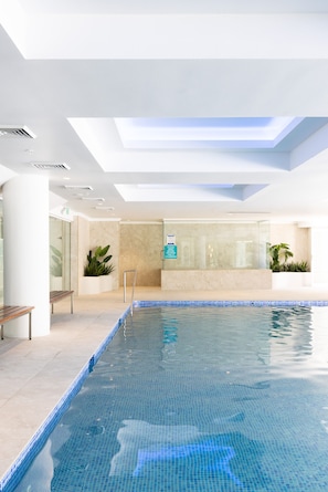 Indoor pool, outdoor pool, open 8:00 AM to 8:00 PM, pool loungers