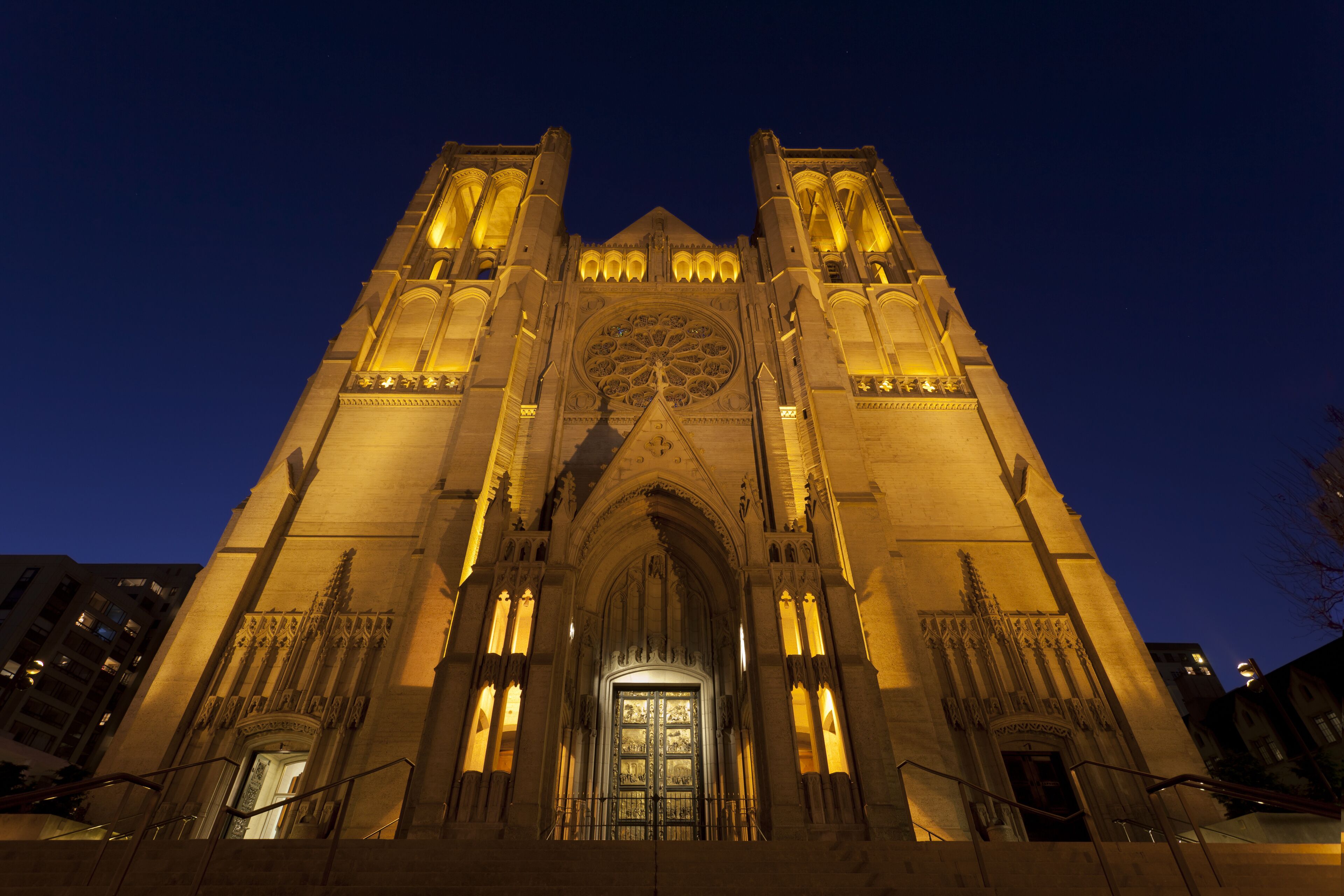 A large cathedral with a prominent rose window and two towers.