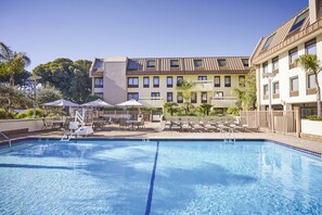 Outdoor pool, a heated pool, pool umbrellas, sun loungers