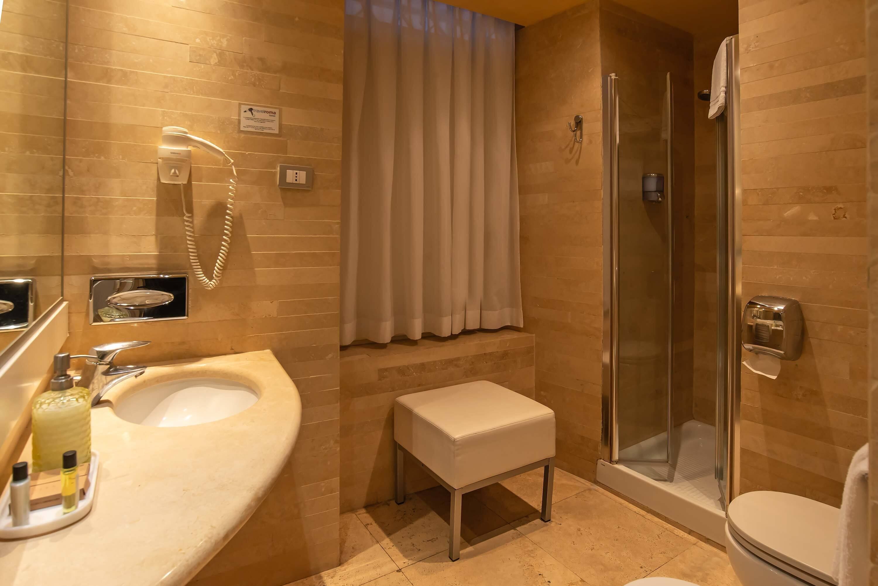 free toiletries, hair dryer, bidet, towels