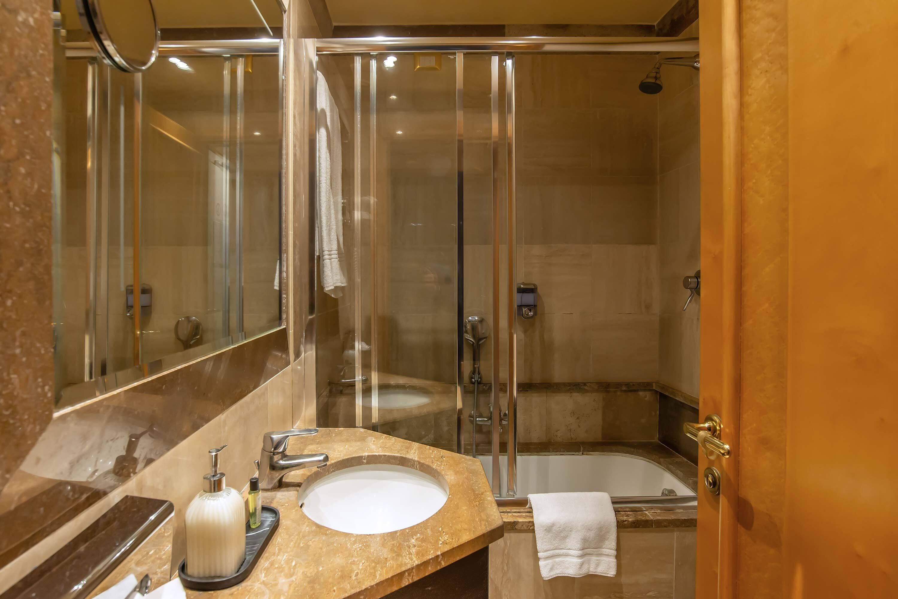 free toiletries, hair dryer, bidet, towels