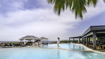 Outdoor pool, pool umbrellas, pool loungers