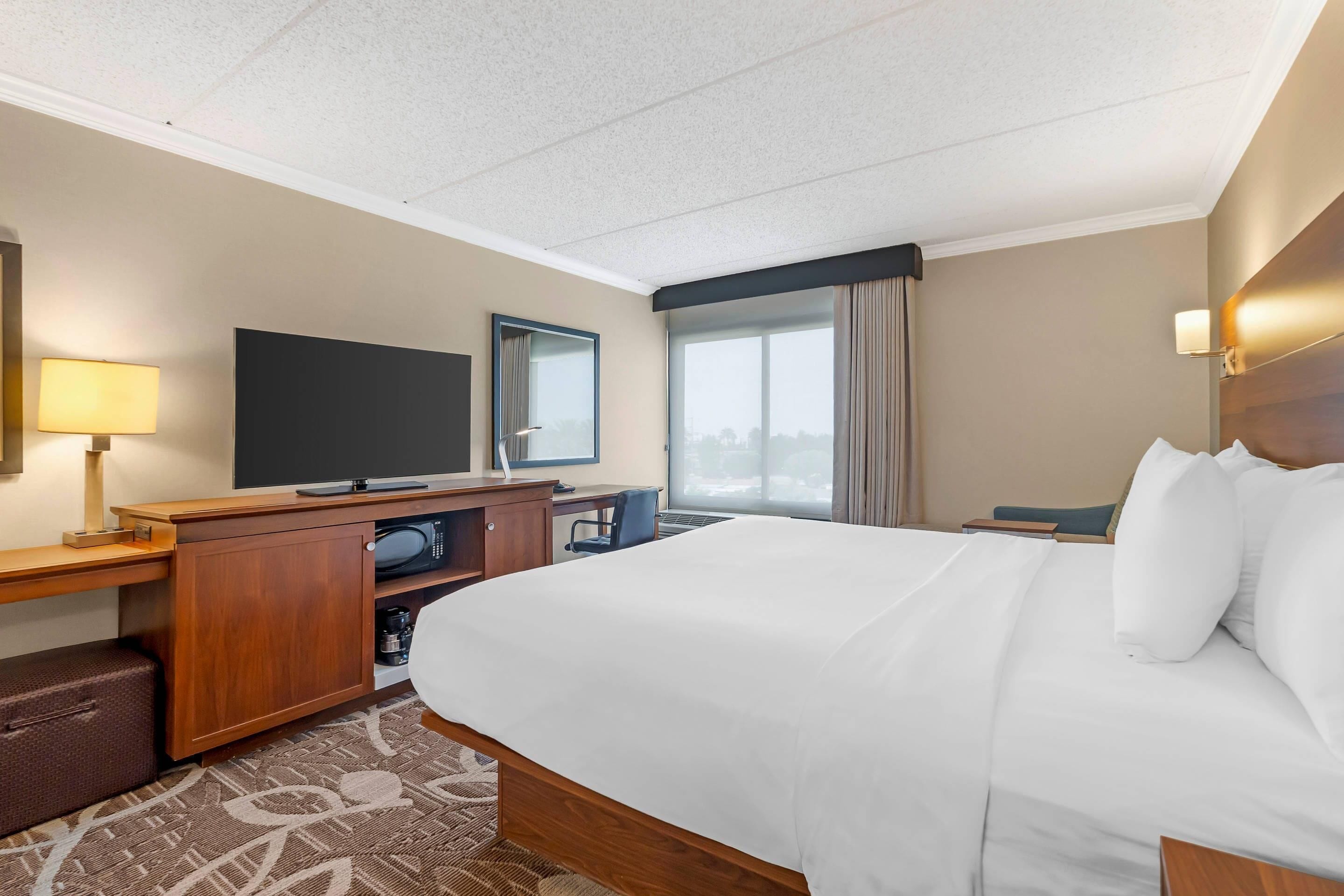 pillow-top beds, desk, blackout curtains, iron/ironing board