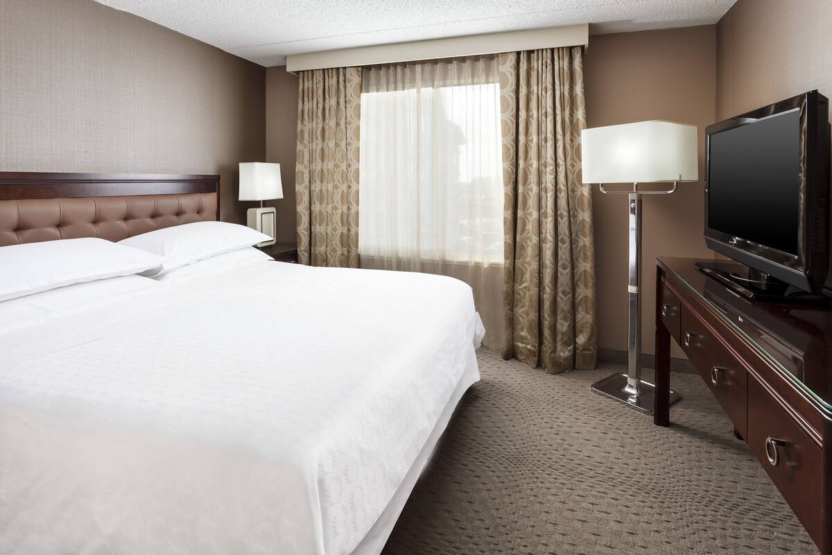 Premium bedding, pillowtop beds, desk, laptop workspace