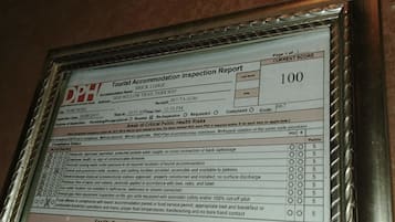 A Tourist Accommodation Inspection Report for BRICK LODGE, scoring 100.