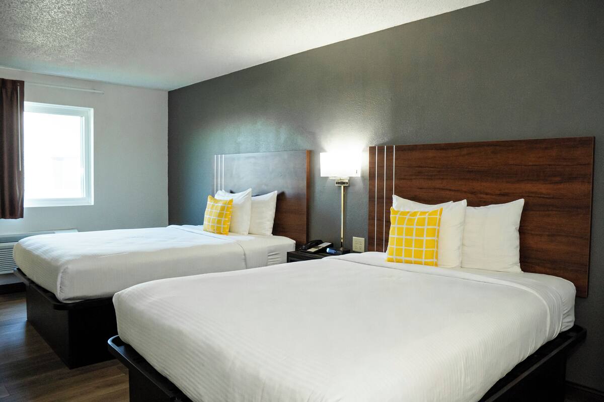 Standard Room, 2 Queen Beds, Non Smoking (42 inch TV) | Desk, laptop workspace, blackout curtains, iron/ironing board