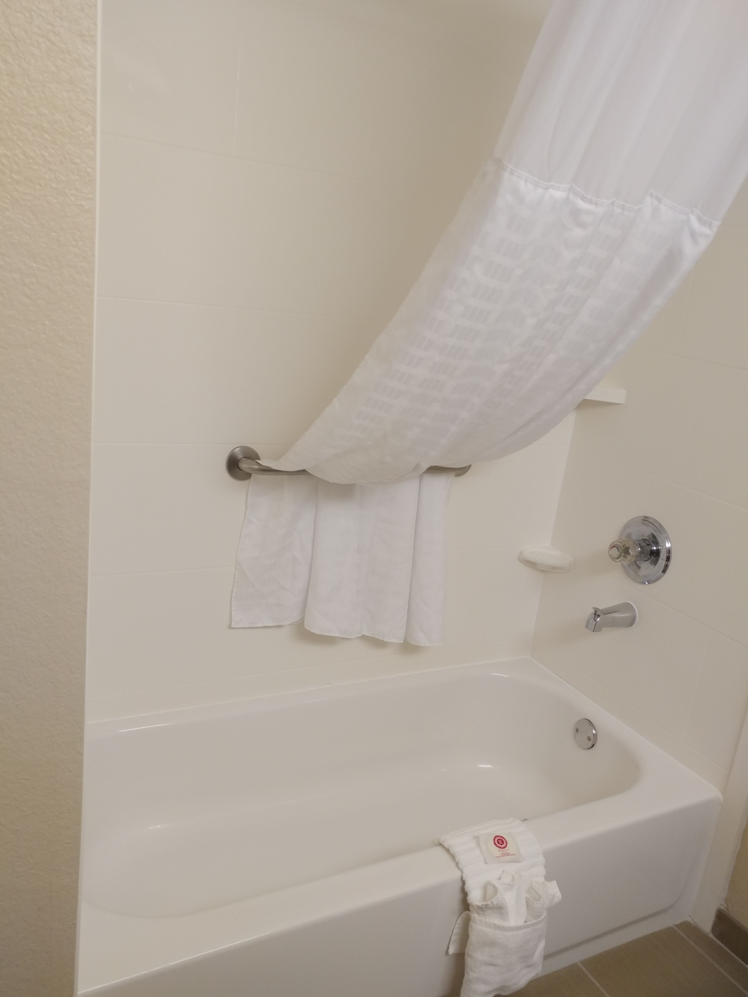 combined shower/bathtub, free toiletries, hair dryer, towels