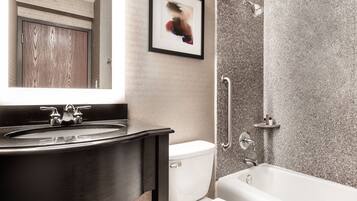 Standard Room, 1 King Bed | Bathroom | Combined shower/tub, free toiletries, hair dryer, towels