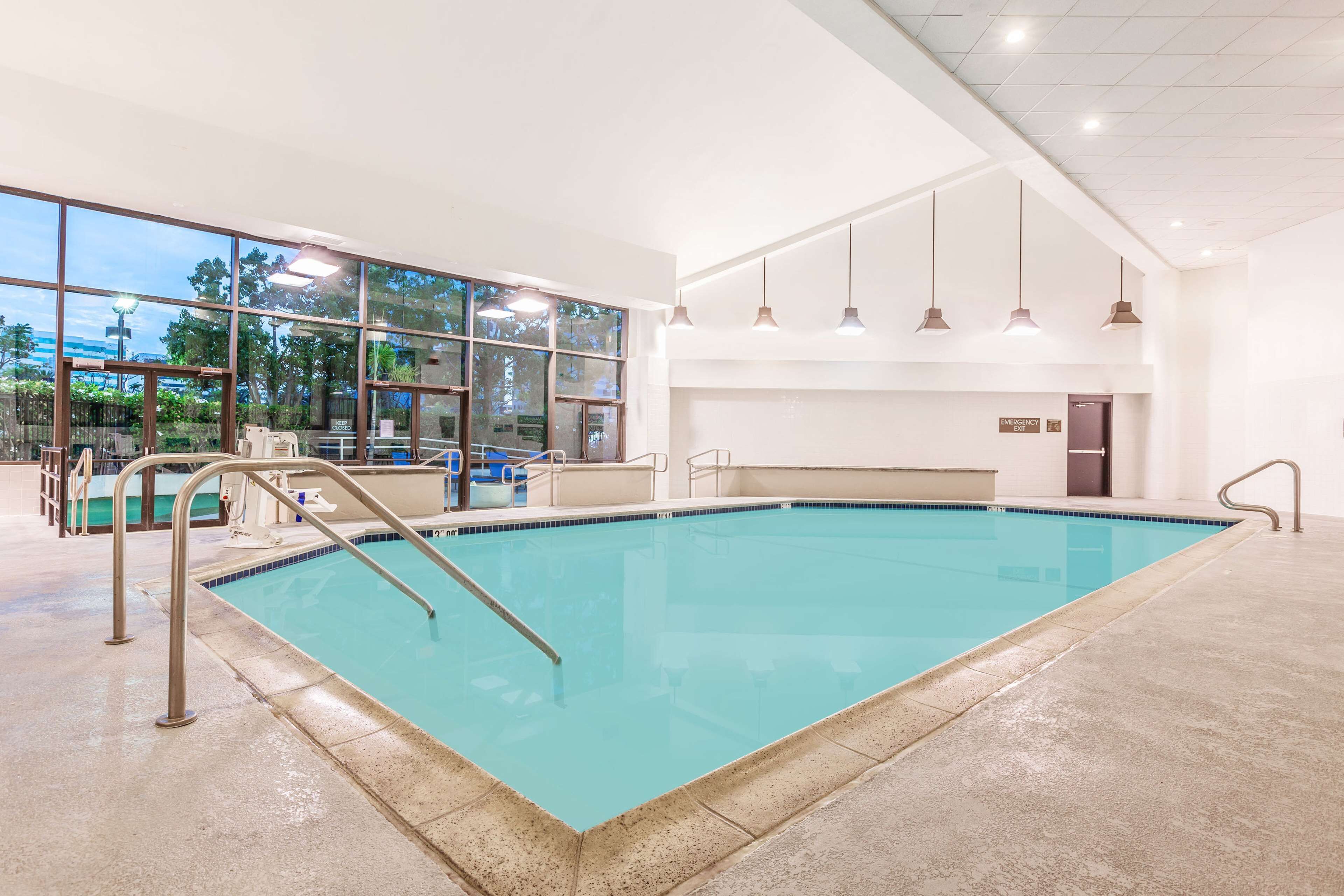 indoor pool, open 6:00 am to 10:00 pm, pool loungers